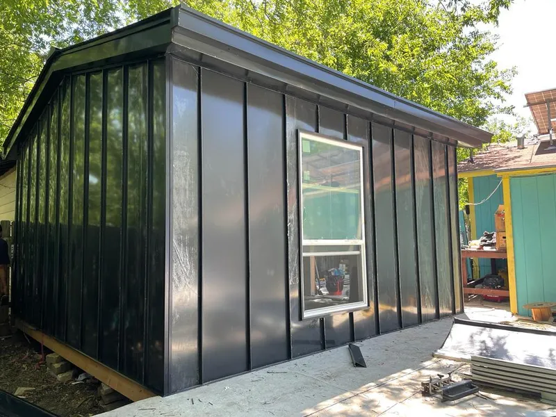 Black standing seam metal wall panels for Metal Roof Installation in Junction City